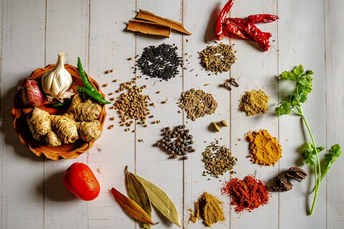 Ayurvedic herbs and powders in small bowls